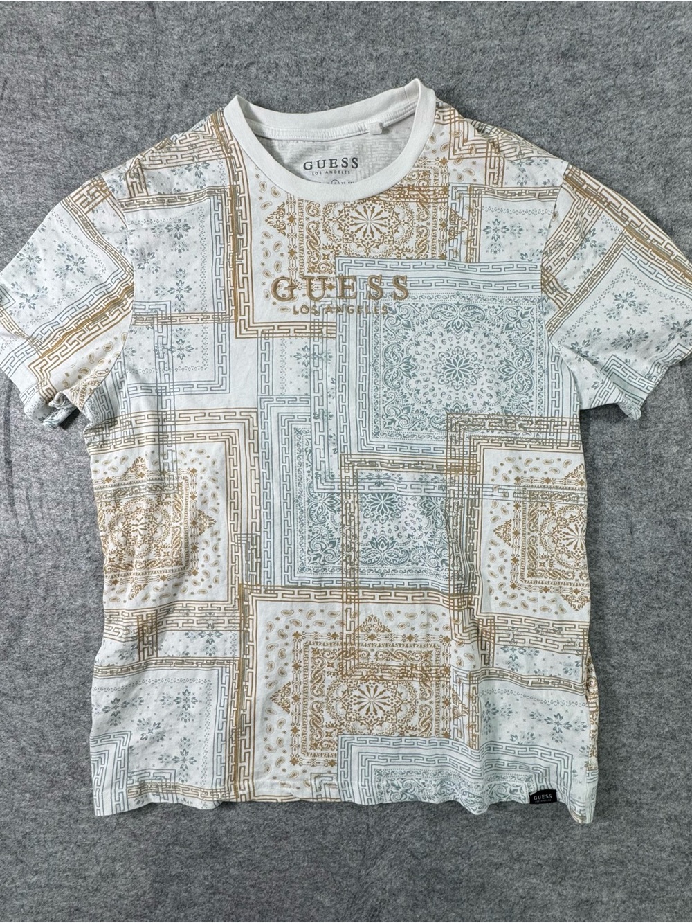 GUESS Men's White Tee with Gold and Light Blue Ornamental Print